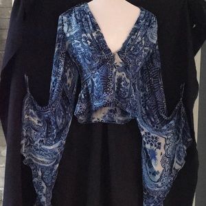 Silk printed Roberto Cavalli blouse.